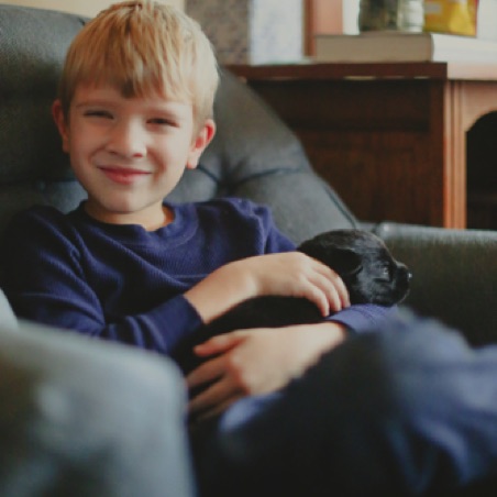 Joseph enjoys puppy time Joseph enjoys puppy time